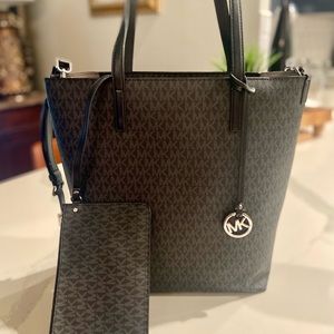 Michael Kors tote black and gray monogram perfect condition.